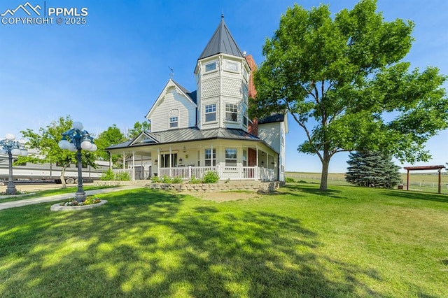 view of front of house featuring a front lawn and a porch