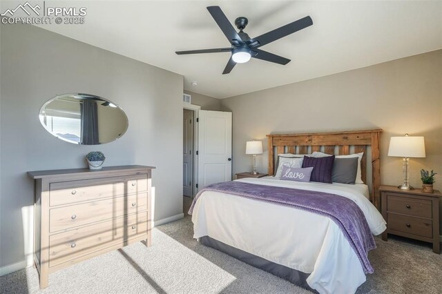 bedroom with ceiling fan and carpet