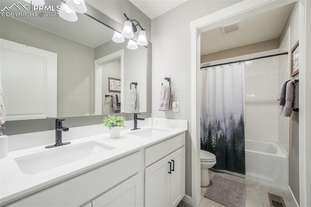 full bathroom featuring tile patterned floors, vanity, toilet, and shower / tub combo with curtain