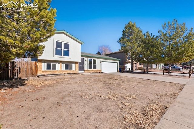 tri-level home featuring a garage