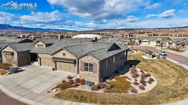 bird's eye view with a mountain view