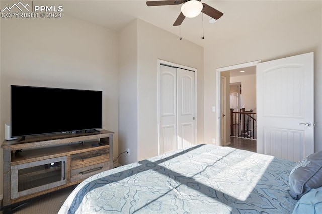 bedroom with ceiling fan and a closet