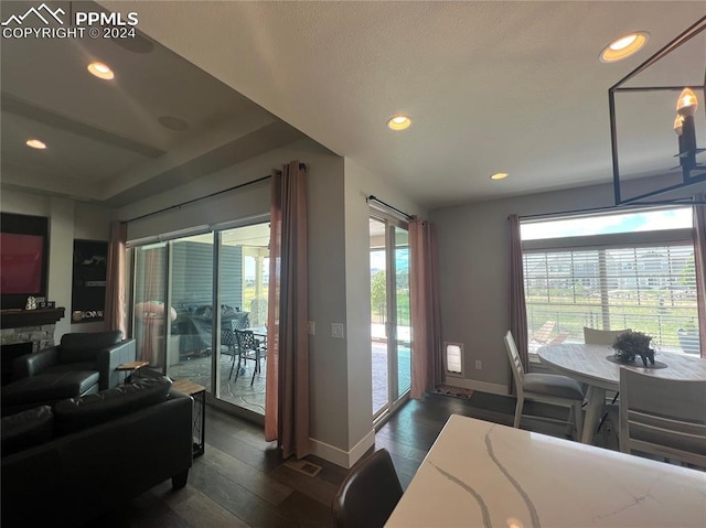 dining space featuring dark hardwood / wood-style floors