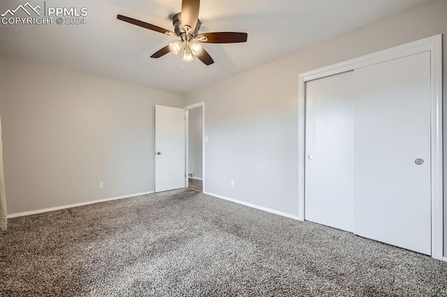 unfurnished bedroom with carpet flooring, a closet, and ceiling fan