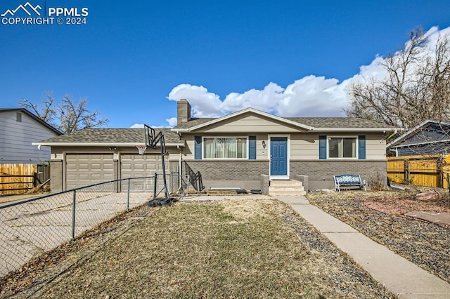 view of front of property featuring a garage