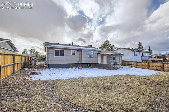 view of snow covered property