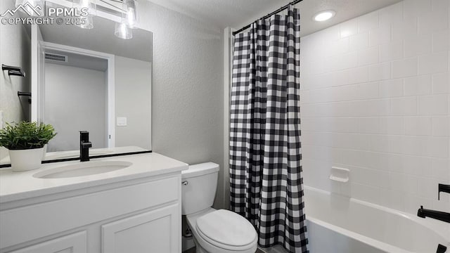 13358 Savannah Falls Ct, Peyton, CO 80831 - full bath with toilet, vanity, a textured wall, and visible vents