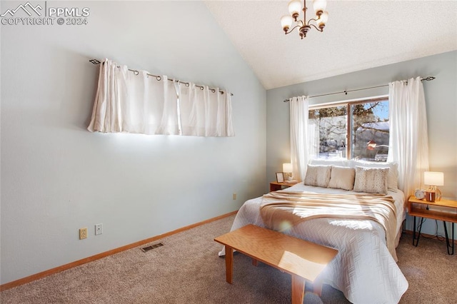 carpeted bedroom with high vaulted ceiling and a chandelier