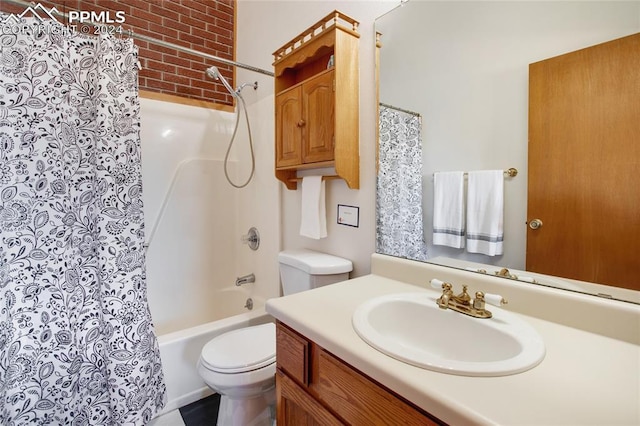 full bathroom with shower / bathtub combination with curtain, vanity, and toilet