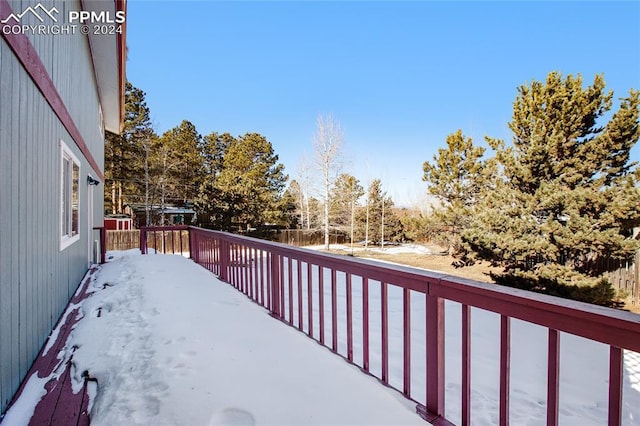 view of snow covered deck