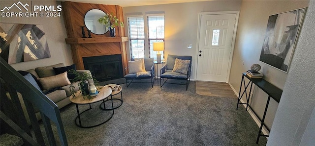 living room with dark carpet