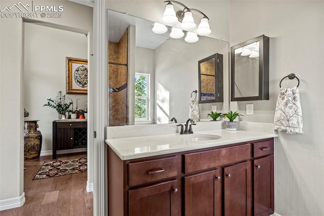 bathroom featuring hardwood / wood-style floors and vanity