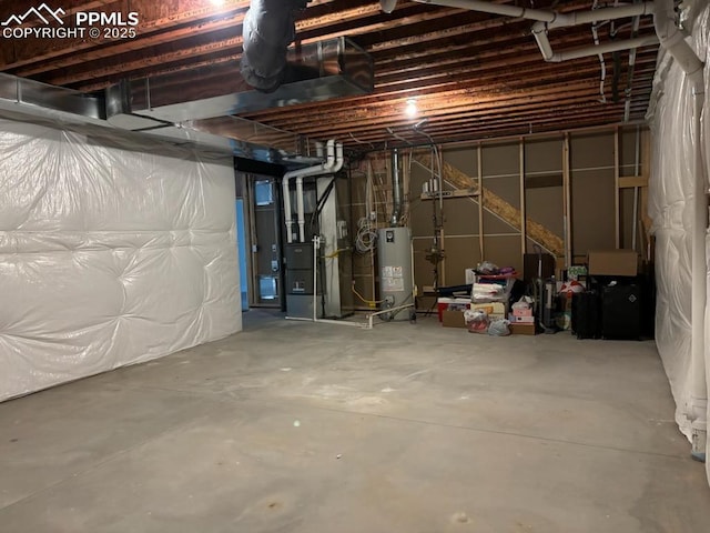 basement with heating unit and water heater