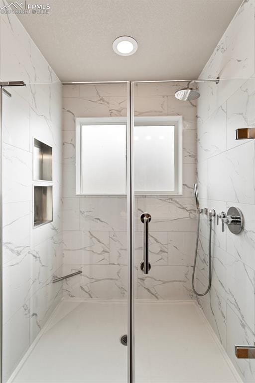 bathroom featuring walk in shower