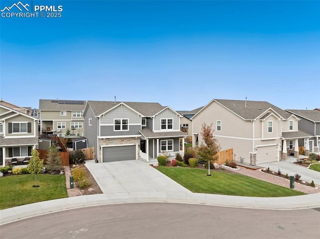 view of front of property featuring a front yard and a garage