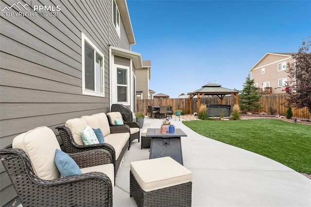 view of patio with a jacuzzi, a gazebo, and an outdoor living space