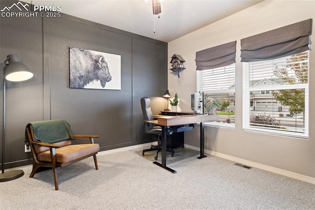 office space featuring ceiling fan and carpet floors