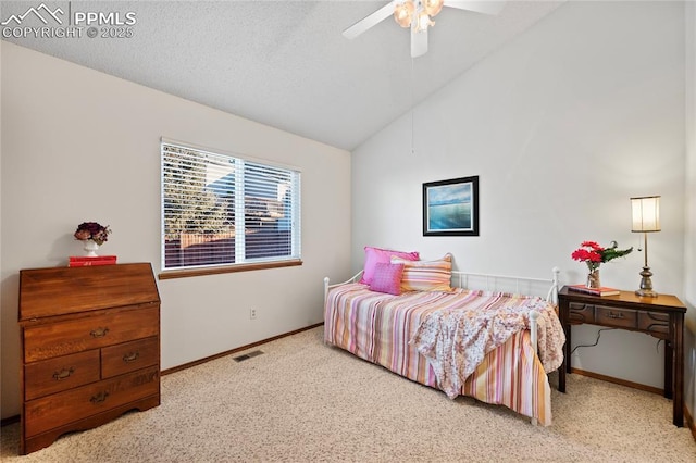 carpeted bedroom featuring lofted ceiling and ceiling fan