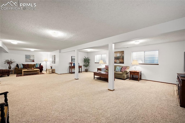 living room featuring a textured ceiling and carpet