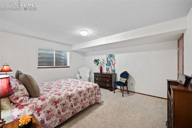 carpeted bedroom featuring a textured ceiling