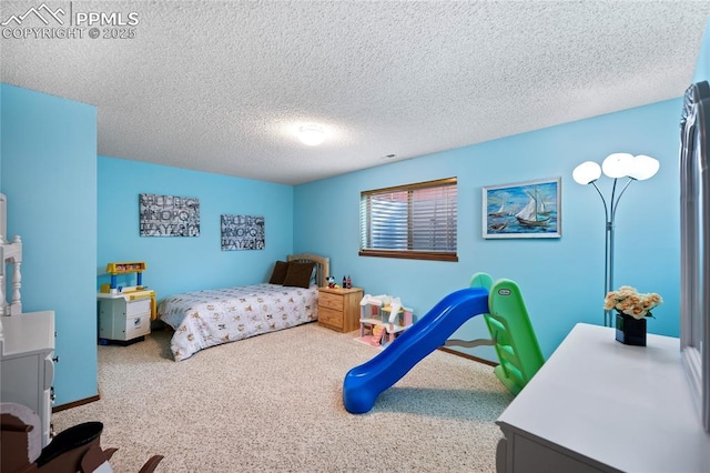 carpeted bedroom with a textured ceiling