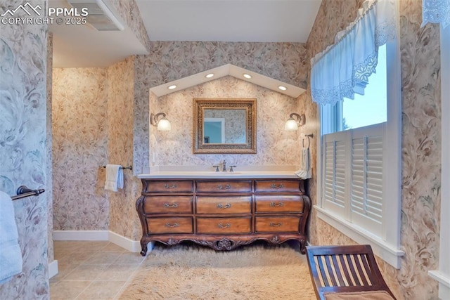 bathroom featuring tile patterned floors and vanity