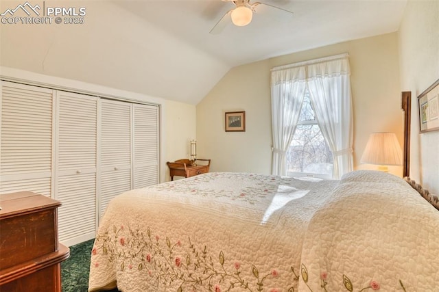 bedroom with carpet, a closet, ceiling fan, and lofted ceiling