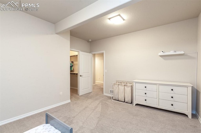 bedroom with light colored carpet