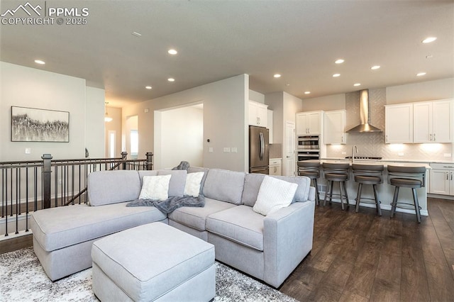 living room with dark hardwood / wood-style flooring