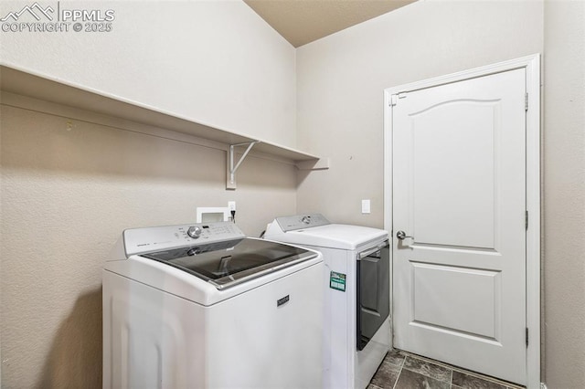 laundry area with washer and clothes dryer