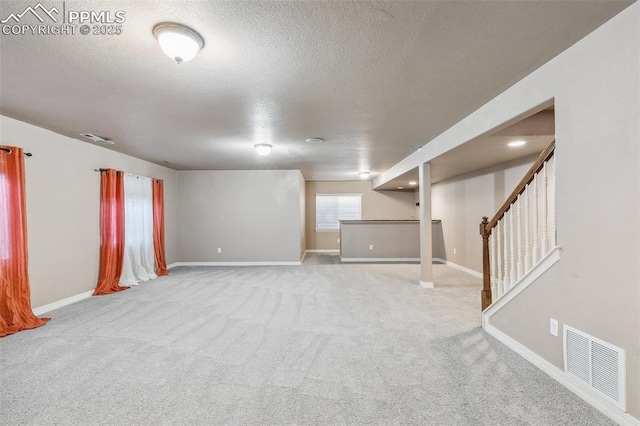 interior space featuring a textured ceiling