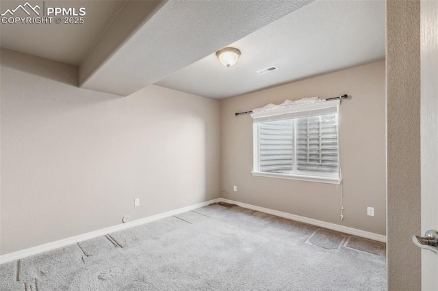 view of carpeted spare room