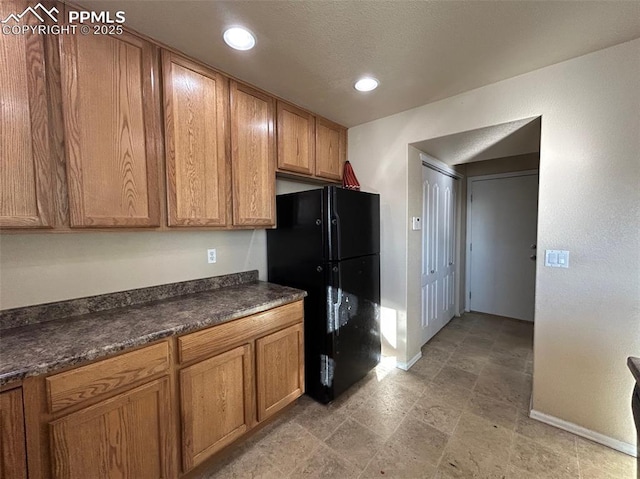 kitchen with black fridge