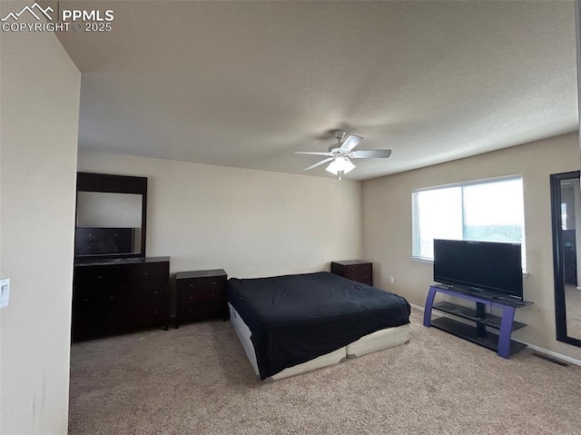 bedroom featuring carpet and ceiling fan