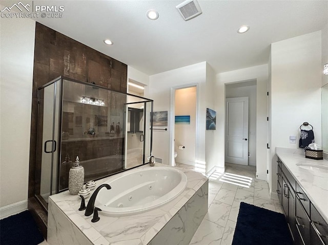 full bathroom featuring vanity, toilet, and shower with separate bathtub