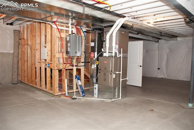 basement with heating unit and water heater