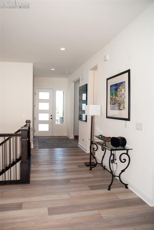 foyer with light hardwood / wood-style floors