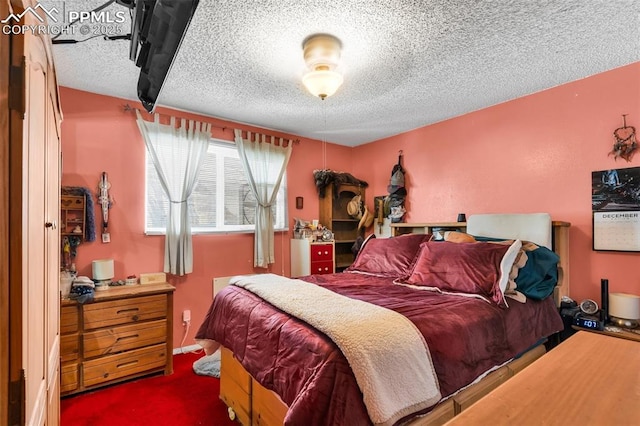 bedroom with dark carpet