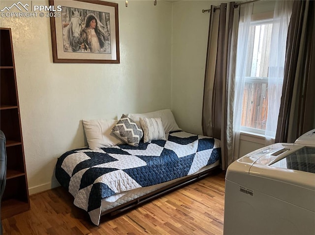 bedroom featuring hardwood / wood-style floors