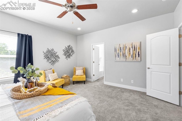 carpeted bedroom featuring ensuite bathroom and ceiling fan