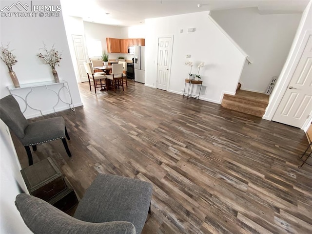 interior space with dark wood-type flooring