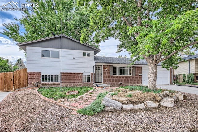 split level home with a garage