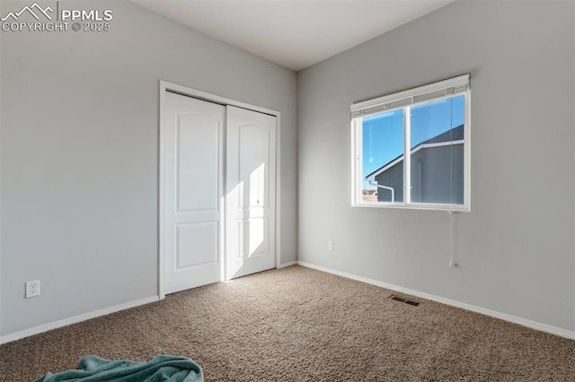 view of carpeted spare room