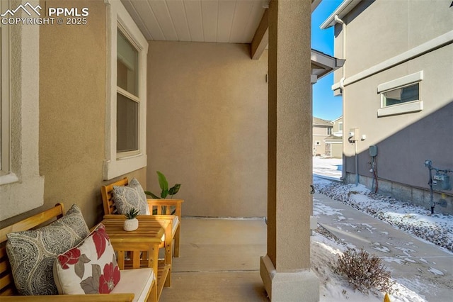 view of snow covered patio