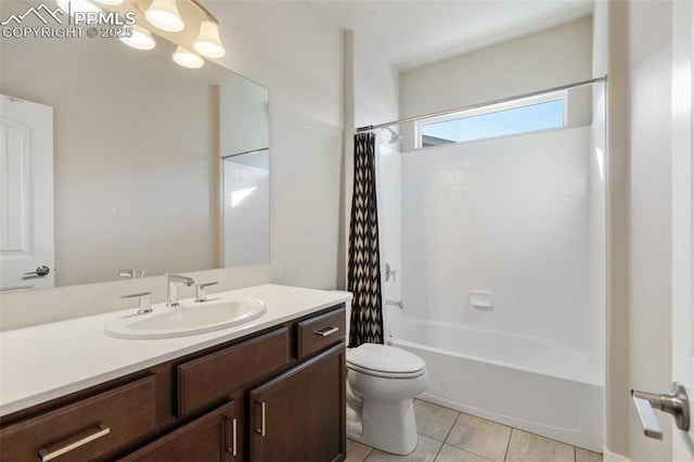 full bathroom featuring tile patterned flooring, vanity, toilet, and shower / bath combo