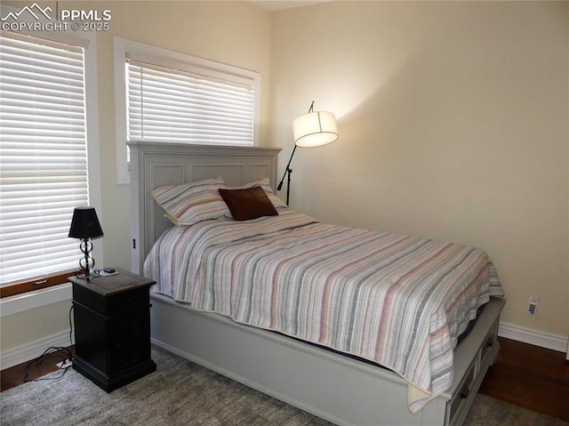 bedroom with multiple windows