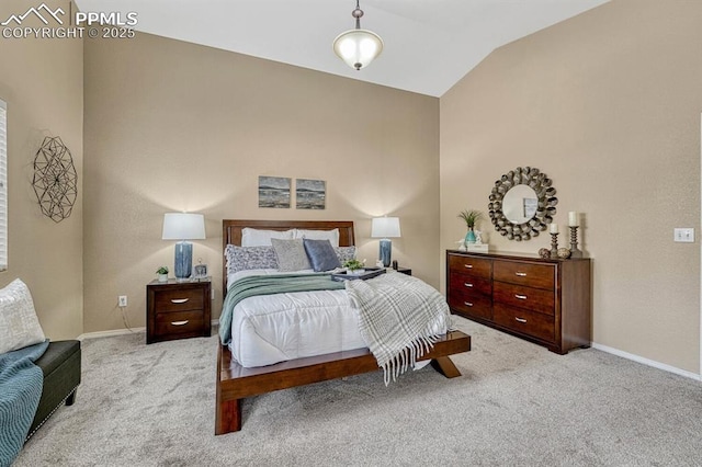 carpeted bedroom featuring lofted ceiling