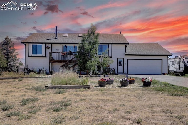 view of front of property with a garage