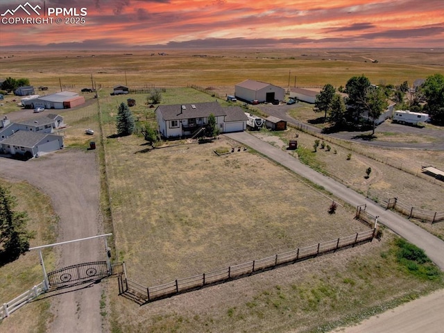 aerial view at dusk with a rural view