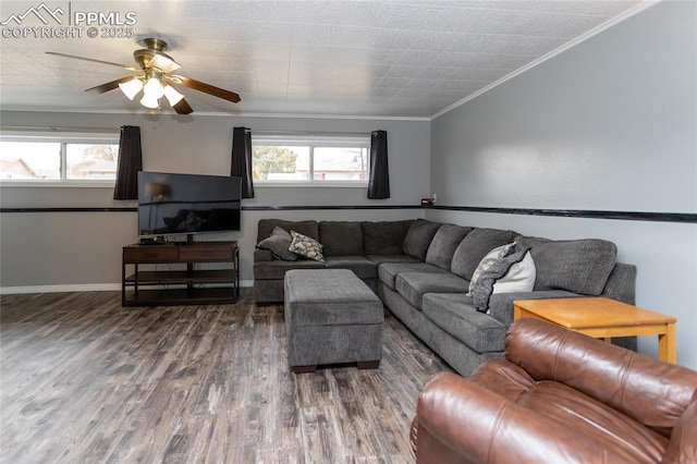 living room featuring ceiling fan, dark hardwood / wood-style flooring, and crown molding